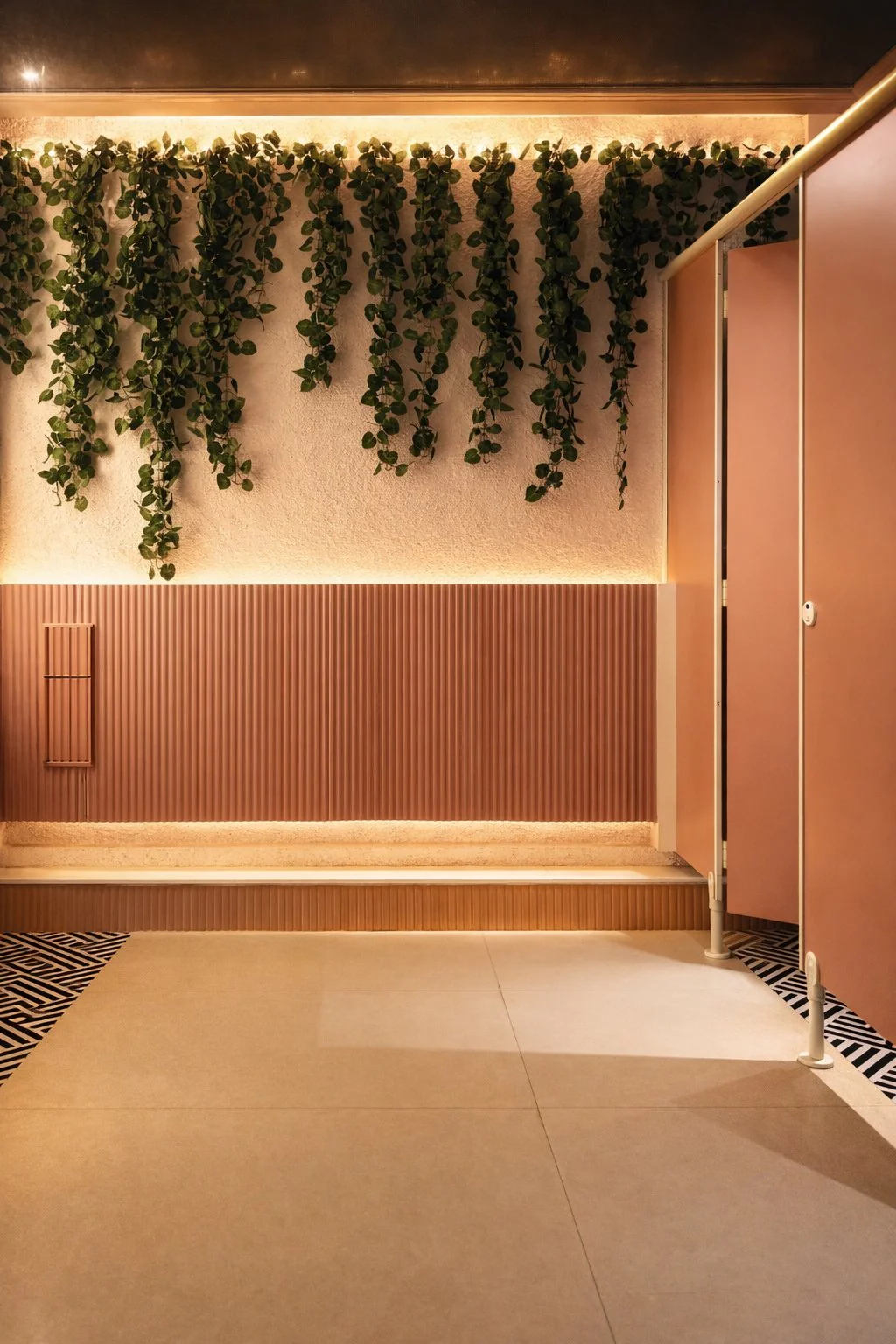 Mysore Union interior design, Mysuru — ladies washroom in fluted terracotta with hanging greenery